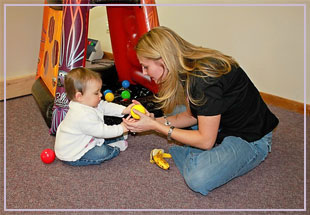 laree-teaching laree working with child